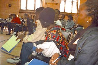 Attendees Listen at the Getting Paid Workshop